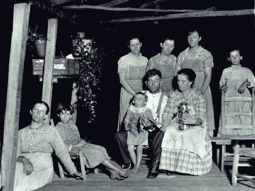 The Chesser Family on the porch of their home.