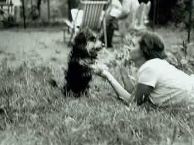 Leona Hudson and her dog Corky, n.d..