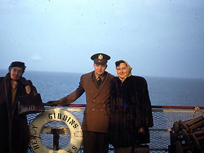 Rosa[?], Dugald, and Leona sailing together on what may be another ferry. 1950's.