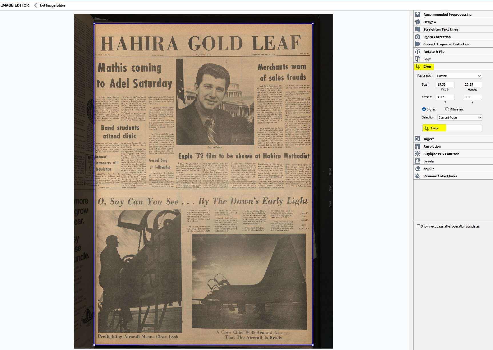 ABBYY FineReader Image Editor with the Crop tool selected and a newspaper page outlined for cropping